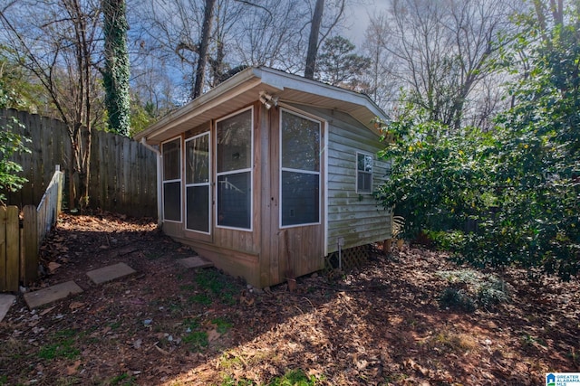 view of outdoor structure with a fenced backyard