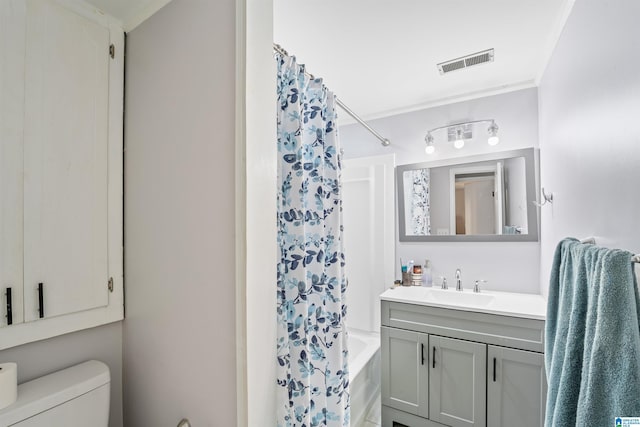 bathroom with toilet, shower / bathtub combination with curtain, visible vents, and vanity