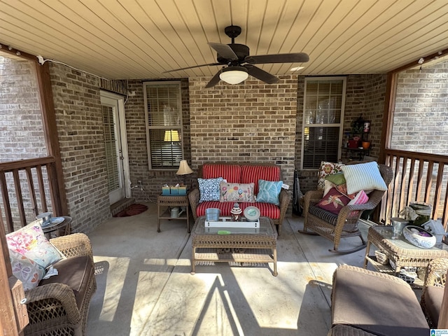 view of patio featuring an outdoor hangout area and a ceiling fan