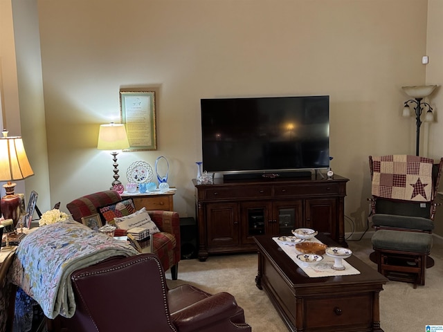 living area featuring light colored carpet