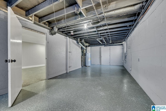 garage with concrete block wall and water heater