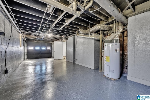 basement featuring water heater and a garage