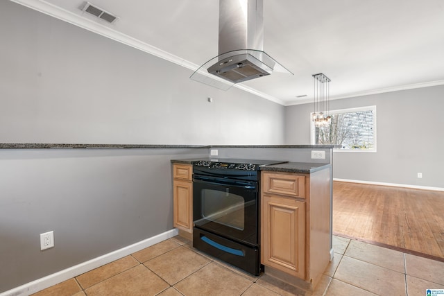 kitchen with light tile patterned floors, visible vents, black range with electric stovetop, hanging light fixtures, and island range hood