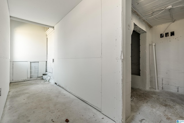 miscellaneous room with concrete flooring