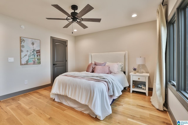 bedroom with a ceiling fan, recessed lighting, baseboards, and light wood finished floors