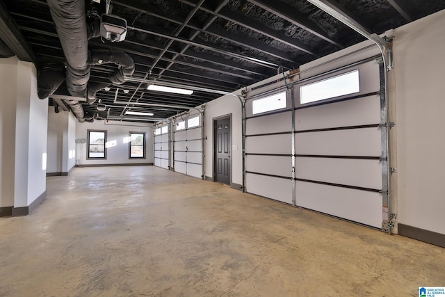 garage featuring baseboards