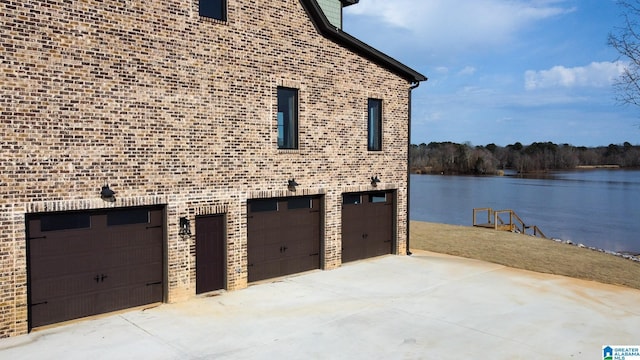 garage featuring a water view