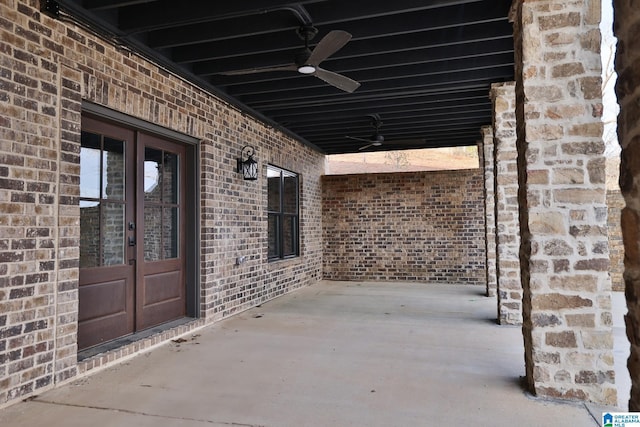 view of patio featuring french doors and a ceiling fan