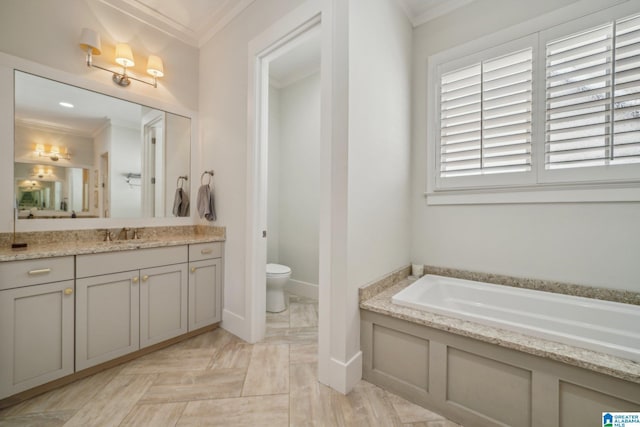 51 Nolen St, Birmingham, AL 35242 - full bath with baseboards, toilet, a garden tub, crown molding, and vanity