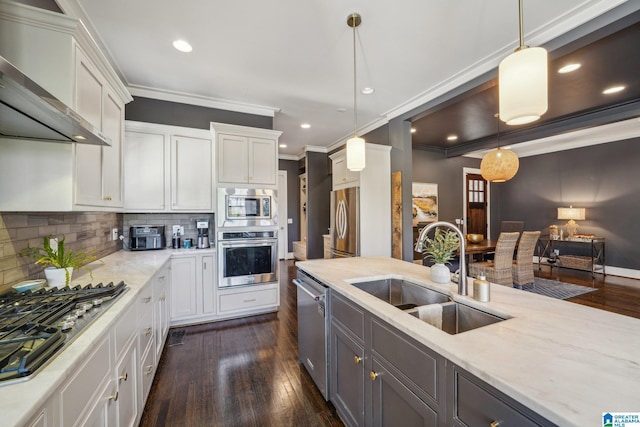51 Nolen St, Birmingham, AL 35242 - kitchen with appliances with stainless steel finishes, white cabinets, a sink, and decorative light fixtures