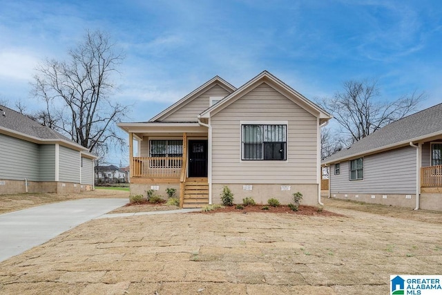 view of front of home featuring a porch and crawl space