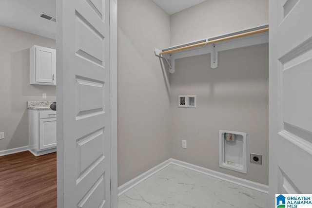 clothes washing area featuring marble finish floor, hookup for a washing machine, visible vents, hookup for an electric dryer, and baseboards