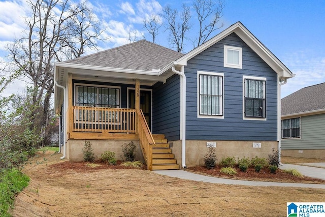 bungalow with stairs, a shingled roof, crawl space, and a porch