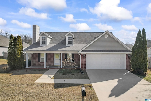 view of front of home featuring a porch, brick siding, driveway, and an attached garage