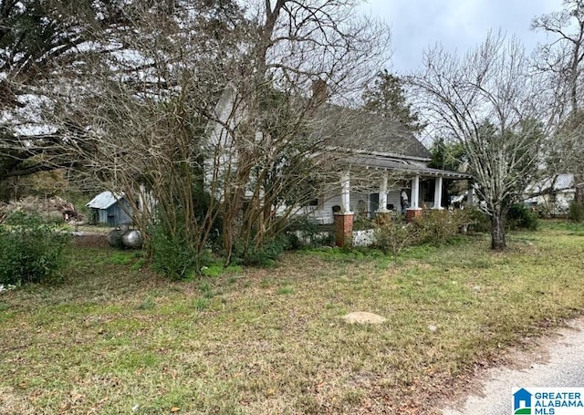 view of home's exterior featuring a lawn