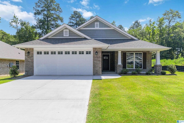 craftsman house with an attached garage, brick siding, a shingled roof, concrete driveway, and a front yard