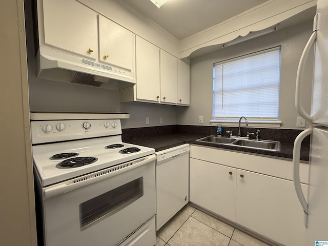 kitchen with white appliances, a sink, white cabinetry, and under cabinet range hood