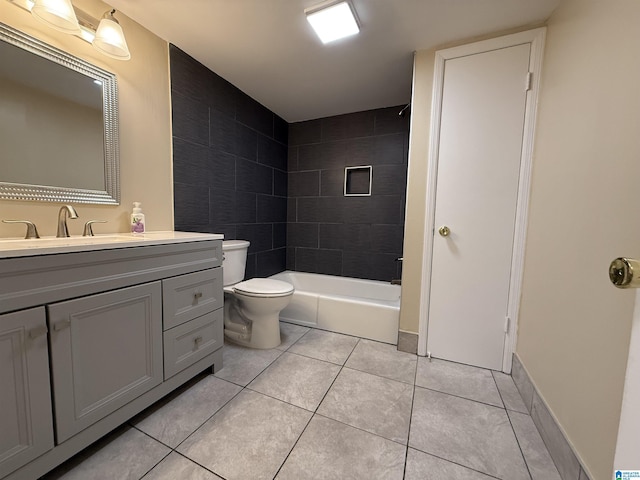 full bath featuring baseboards, toilet, tile patterned floors, tub / shower combination, and vanity