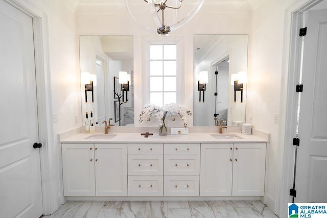 full bath with marble finish floor, a sink, and double vanity