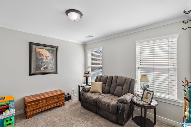 carpeted living room featuring baseboards, visible vents, and ornamental molding