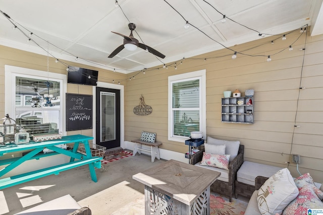 view of patio / terrace featuring ceiling fan and an outdoor living space