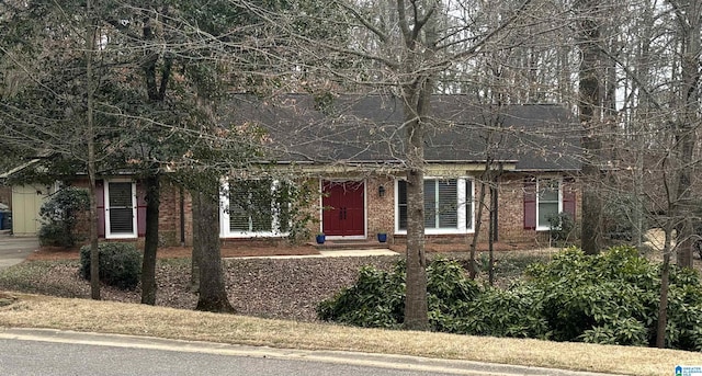 view of front of property featuring brick siding