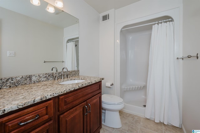 full bathroom with visible vents, toilet, tile patterned flooring, vanity, and a shower stall