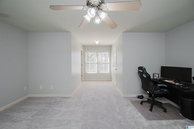 carpeted home office with baseboards