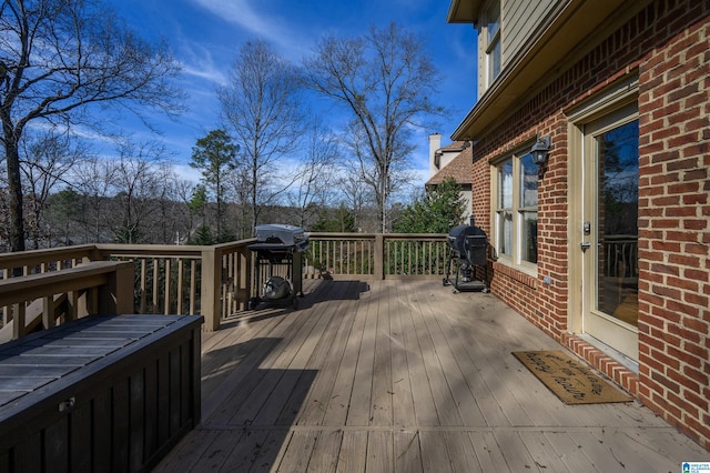 wooden deck with grilling area