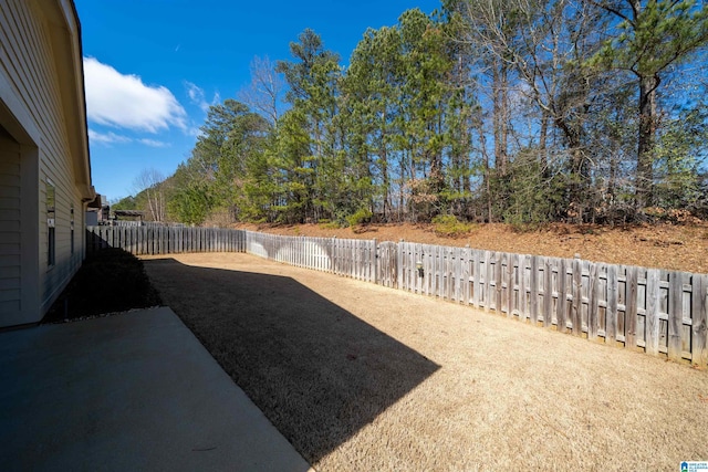 view of yard with a fenced backyard