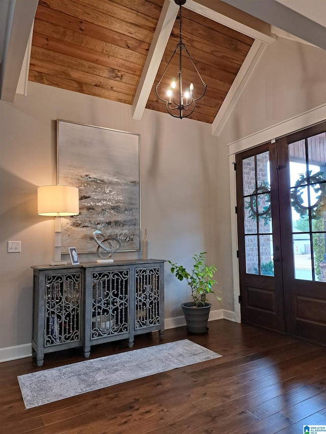 entryway featuring wood ceiling, wood-type flooring, a notable chandelier, and lofted ceiling with beams