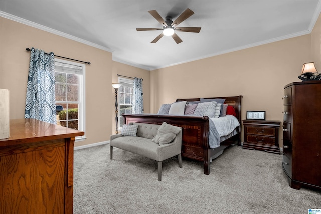 bedroom with carpet, baseboards, and crown molding