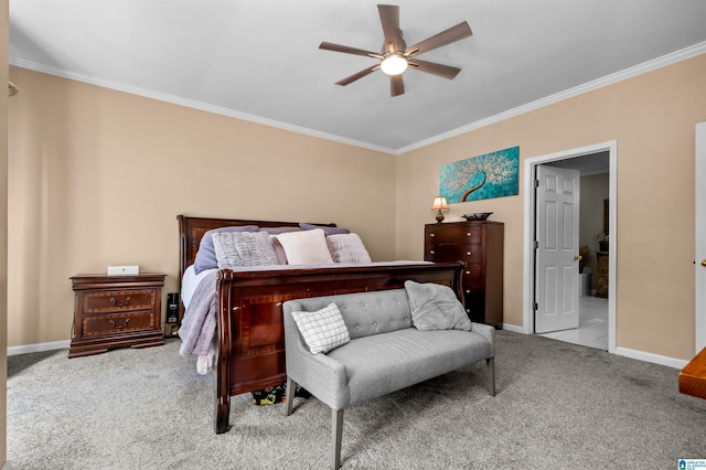 carpeted bedroom featuring ceiling fan, baseboards, and ornamental molding