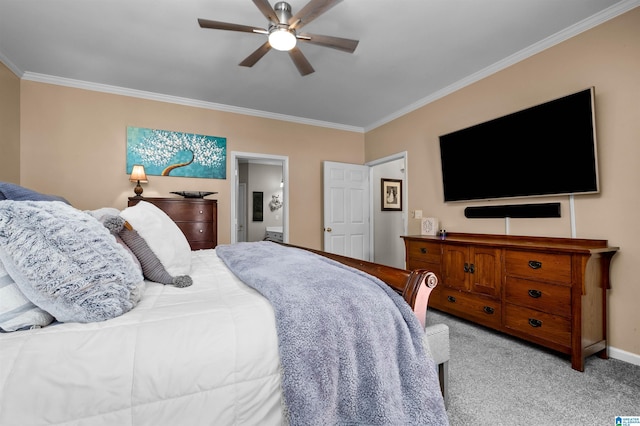 bedroom with baseboards, connected bathroom, light colored carpet, ceiling fan, and ornamental molding