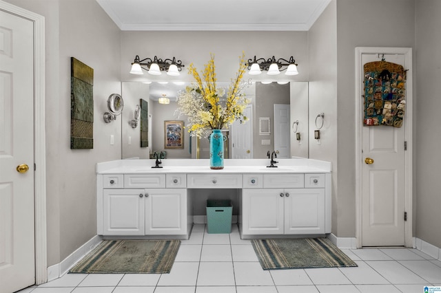 bathroom featuring crown molding, tile patterned floors, a sink, and double vanity