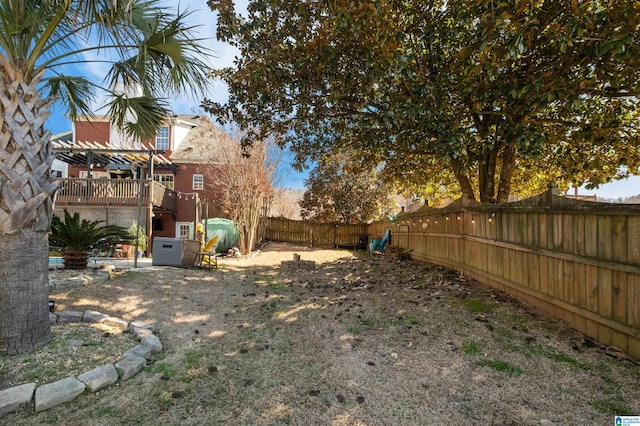 view of yard featuring a fenced backyard