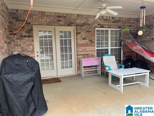 view of patio / terrace with french doors, ceiling fan, and grilling area