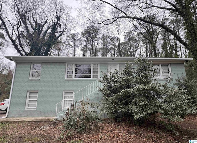 view of front of property featuring brick siding