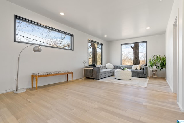 sitting room featuring light wood-style floors and recessed lighting