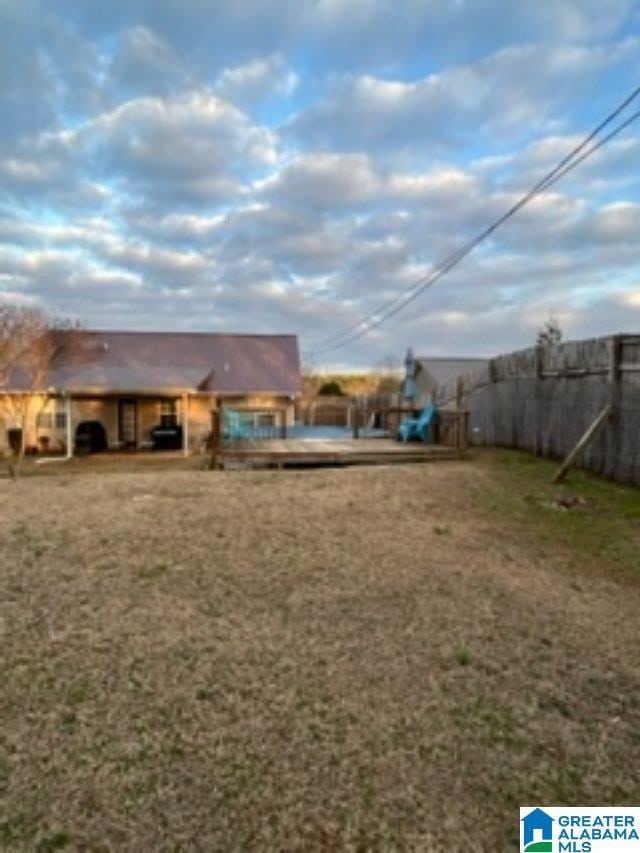 view of yard featuring fence