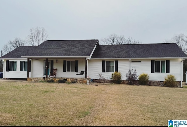 ranch-style house featuring crawl space, a shingled roof, a front lawn, and a porch