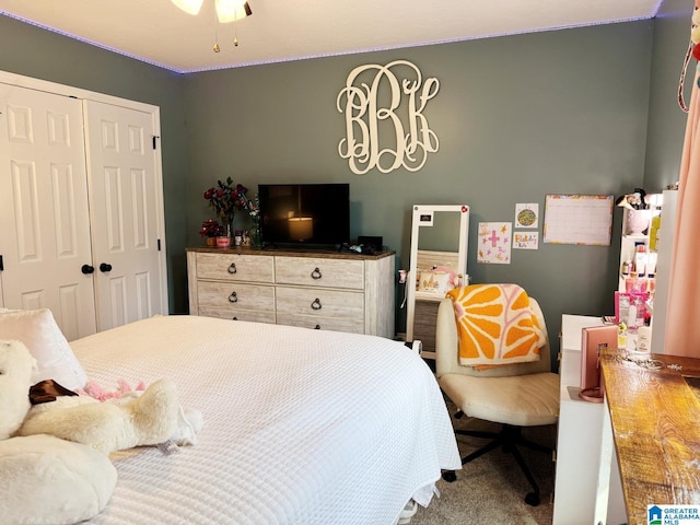 bedroom with a closet and carpet