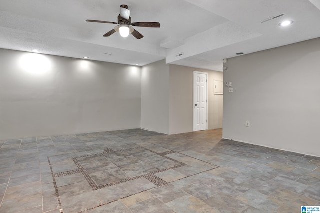 empty room featuring ceiling fan, visible vents, and recessed lighting