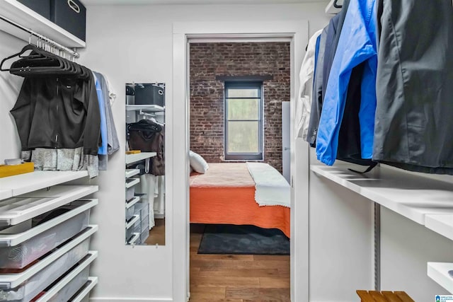 spacious closet with wood finished floors