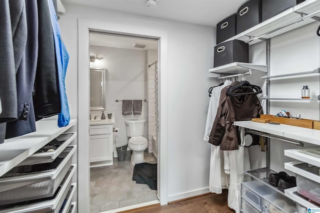 walk in closet featuring visible vents