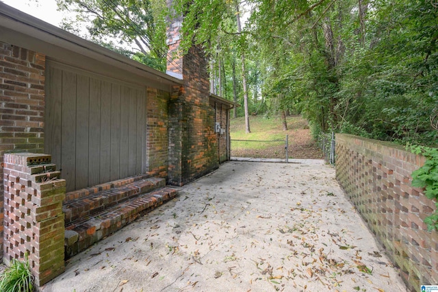 view of patio / terrace with a gate and fence