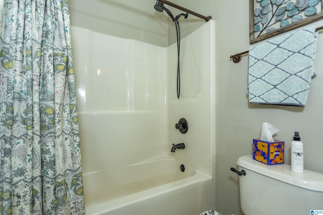 full bath with toilet and shower / tub combo