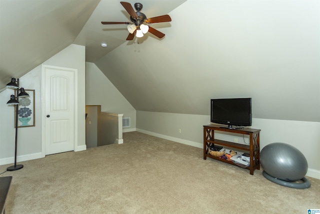 additional living space featuring vaulted ceiling, carpet, visible vents, and baseboards