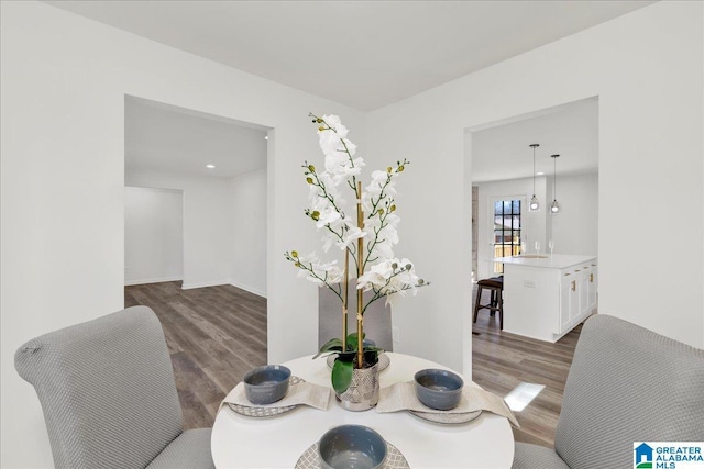 dining area featuring wood finished floors