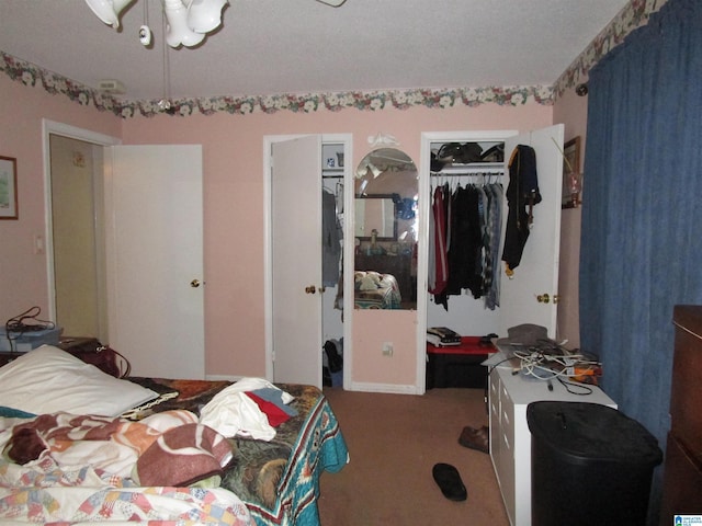 bedroom featuring a closet and carpet flooring